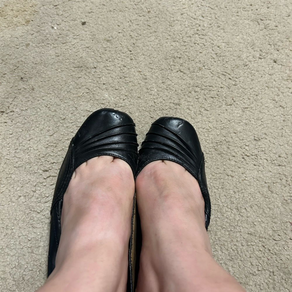 Well worn women’s flats